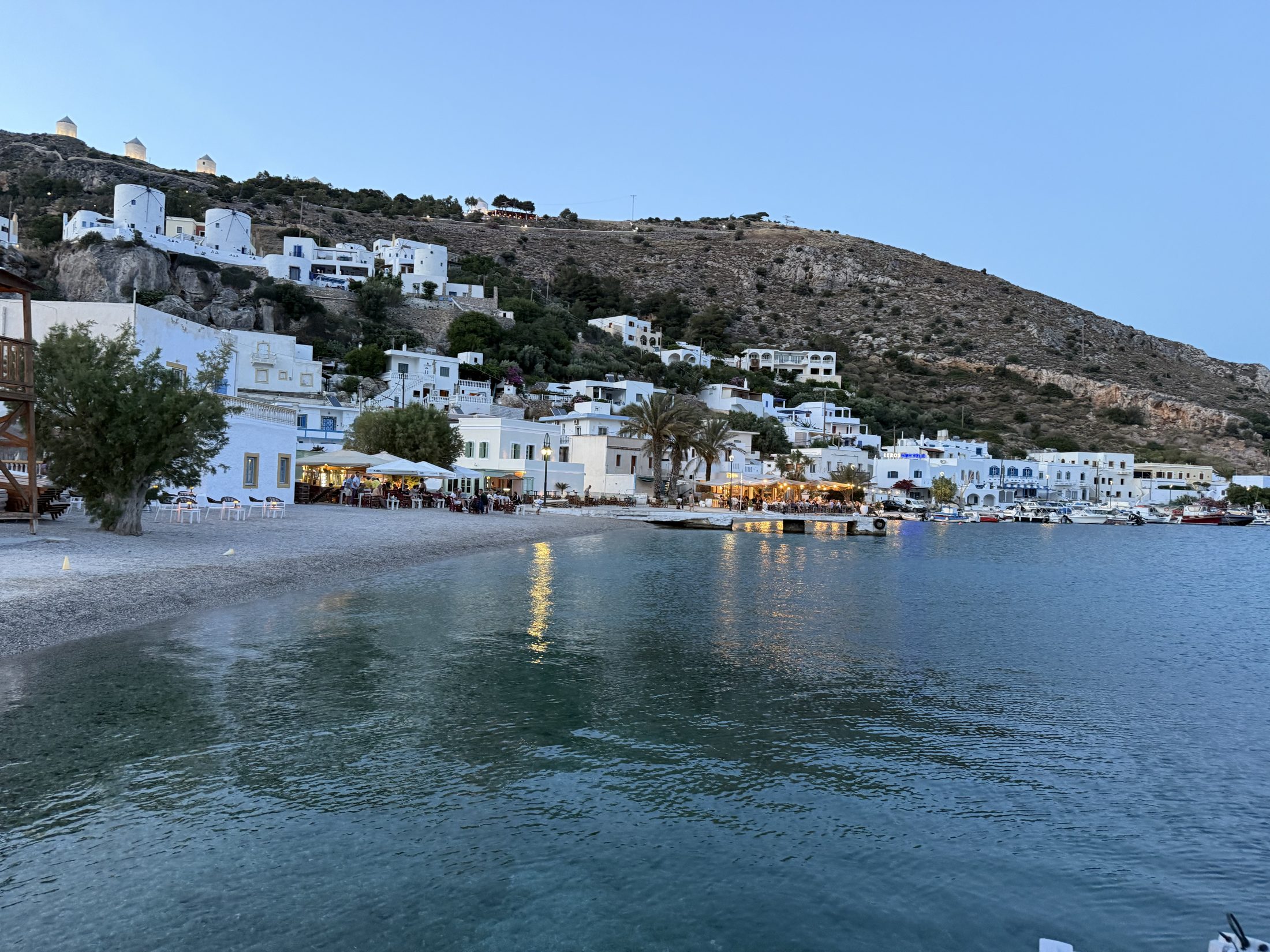 Whitewashed buildings by the water in Greece